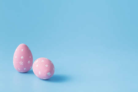 Colored easter eggs on blue backgroundの写真素材