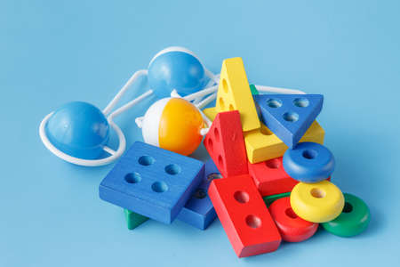 wooden color toy on blue backgroundの写真素材