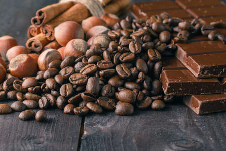 Chocolate, hazelnuts and coffee beansの写真素材