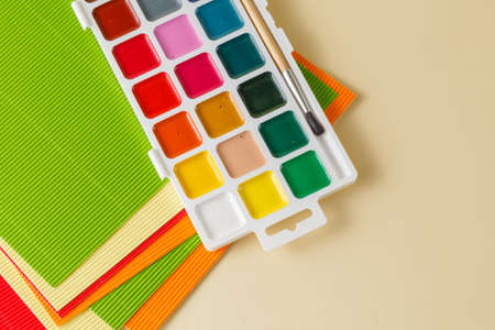 creative education with colored papper and paints
