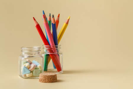 color pencil in glass macro close up with sweetsの写真素材