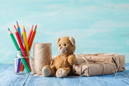 Boxes with gifts surprise, wishes, birthday or holiday a teddy bearの写真素材