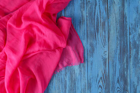 fabric texture cotton and silk crumpled folds lying on a table backgroundの写真素材