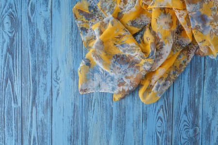 fabric texture cotton and silk crumpled folds lying on a table backgroundの写真素材