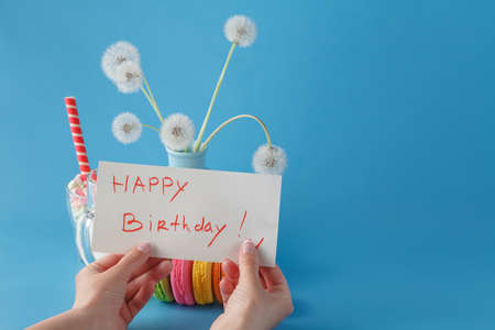 Woman hold message happy birthdayの写真素材