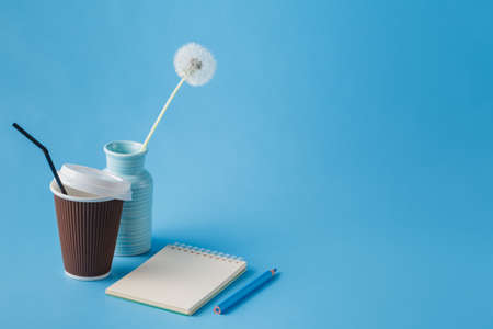 Still life with dandelions and macaroon.の写真素材