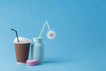 Still life with dandelions and macaroon.の写真素材
