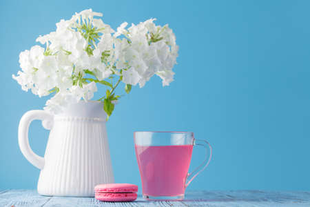 Kissel of currant berries in a glass and macaroonの写真素材