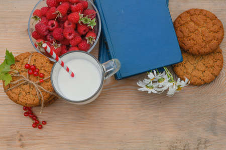 Vacation book reading concept. delicious and healthy breakfast in the garden