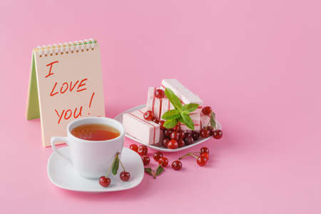 gentle romantic breakfast for his girlfriend with cherry fruit candy and messageの写真素材