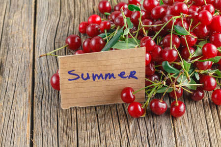 Raw Organic Cherries Ready to Eat with paper tag summerの写真素材