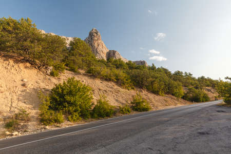 high altitude asphalt road in mountainの写真素材