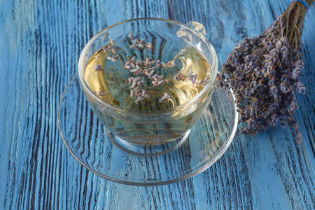 Herbal Tea with Lavender. Lavender tea. A Cup of tea and flowers of the lavenderの写真素材