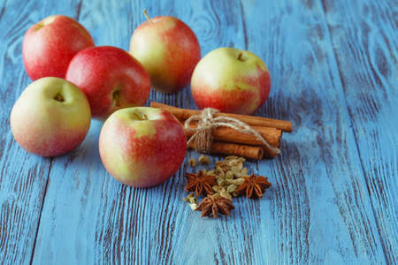Apples and spices - juicy fruits with cinnamon and star aniseの写真素材