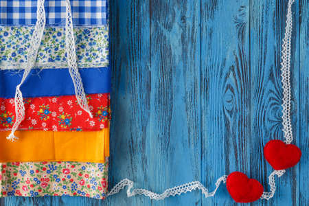 Set of colored felts and threads. Handmade hobby background concept