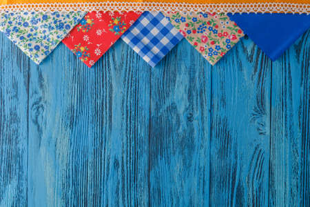 Few pieces of fabric on blue backgroundの写真素材