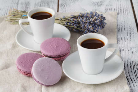 Traditional french eco-friendly dessert Macarons with espresso coffee cupの写真素材