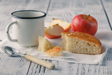 Home evening coffee. manna pie and black coffee in iron mugの写真素材