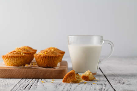 Baked cake and mini muffins with raisinsの写真素材