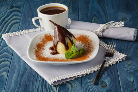 poached pear with chocolateの写真素材