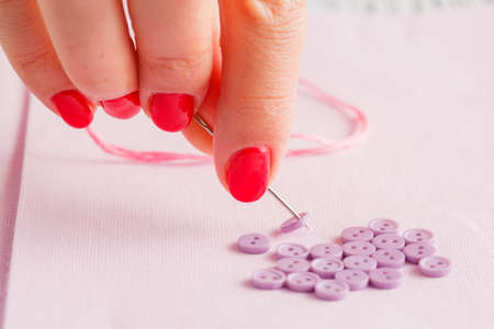 Buttons on a cloth. Shallow depth of field
