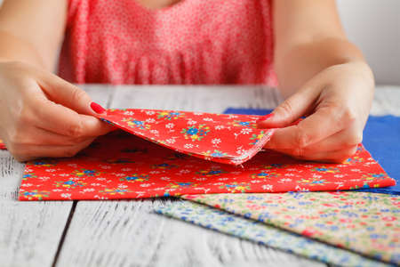 Needlework concept. Female doing crafts
