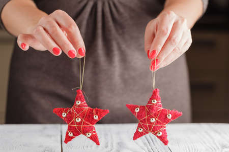 red Christmas ornament in the shape of a star.の写真素材