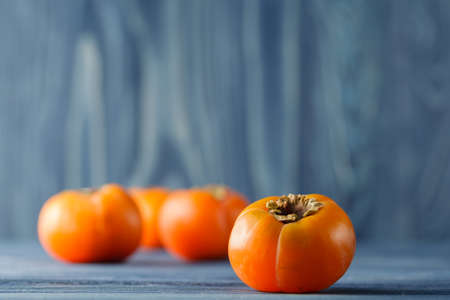 Sweet ripe persimmonsの写真素材