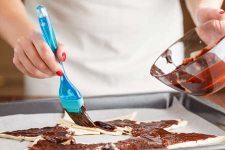 How to make palmier biscuits - french cookies made of puff pastry and chocolateの写真素材