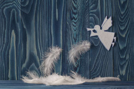 Merry Christmas card with Angel and decorations in paper cut styleの写真素材