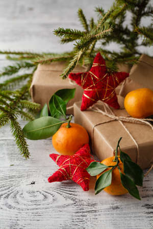 christmas composition in basket with mandarins and fir treeの写真素材