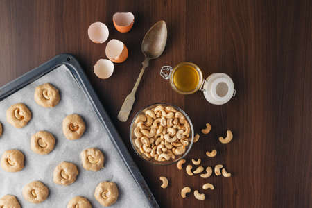Ingredients for baking, milk, eggs, wheat flour, oats and kitchenware