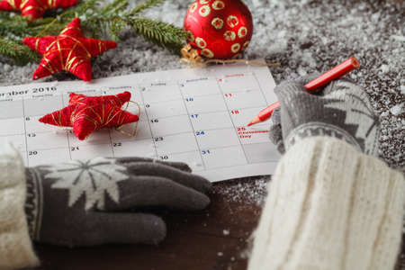 Girl plan to christmas day in calendarの写真素材