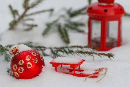 Christmas still life with balls, fir branches and snowの写真素材