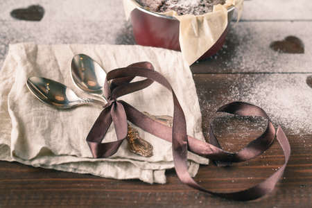 cookies in heart shape on old wooden table. Top viewの写真素材