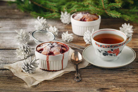 Cranberry cake with icing on festive christmas table.の写真素材