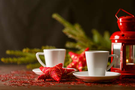 Christmas background with a cup of coffeeの写真素材