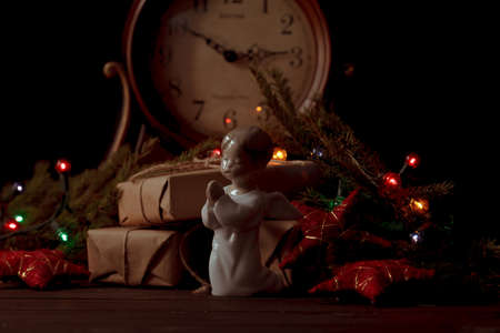 xmas angel on dark table