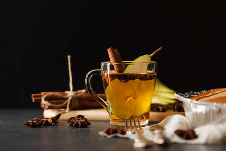 Glass cup of peach punch on winter evening tableの写真素材