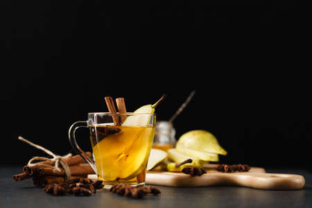 pear punch with sliced fruits and cinnamonの写真素材