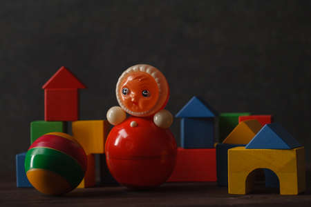 construction from wooden blocks with ugly toyの写真素材