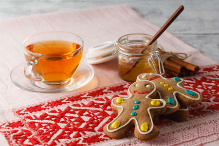 Gingerbread man cookies on red rural napkinの写真素材