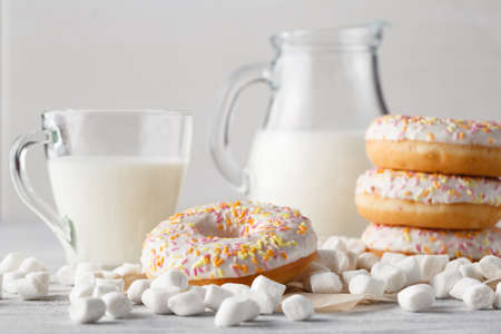 Donuts with cup of  milk for breakfastの写真素材