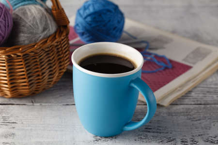 Leisure hobby concept, clew of natural wool on tableの写真素材