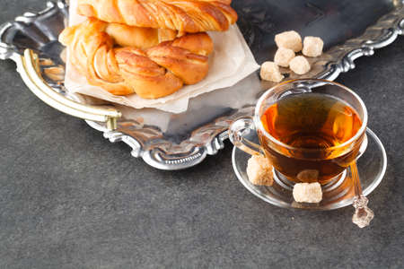 Fresh pastry for breakfast with teaの写真素材