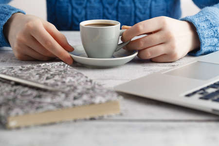 Student preparing for the exam and drink coffee