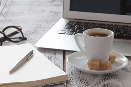 freeelancer Workplace with laprop and coffeeの写真素材