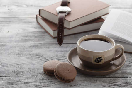 Reading book in time of breakfast with coffeeの写真素材