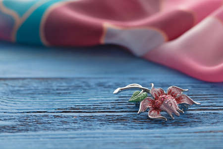 Image  of bijouterie closeup on blue tableの写真素材