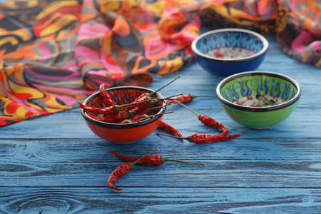 Orient table with cpices on blue tableの写真素材